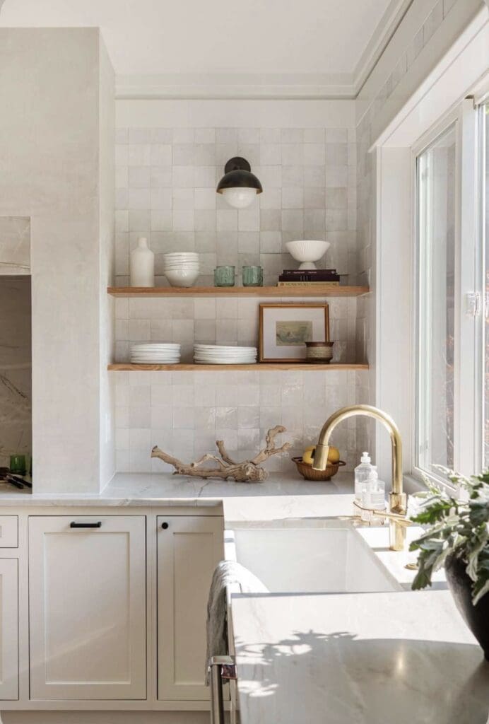 Kitchen inspiration: open timber shelving, ceramics and white cabinetry in a cottage-style kitchen